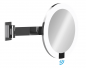 Preview: ALISEO 020832 - Batterie Wand LED Kosmetikspiegel "LED INTERFACE" 3-Fach Vergrößerung, Ø22cm, Infrarotsensor, für 4x AA Batterien, Abschaltautomatik, transluzenter Acrylrahmen